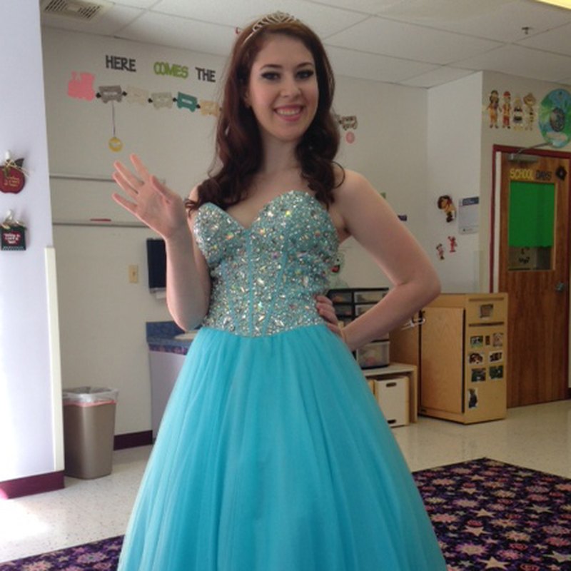 Costume character performer in a ball gown