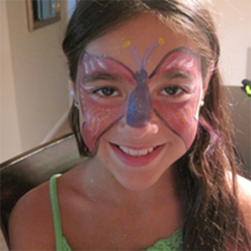 Butterfly face painting design on a child